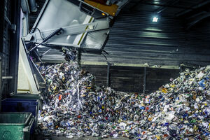 https-www-freshlawblog-com-wp-content-uploads-sites-15-2026-08-tipping-recycling-into-storage-shed_gettyimages-991390276-jpg