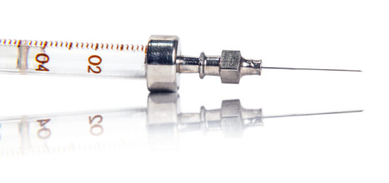 Syringe with reflection