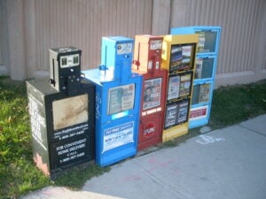 https-www-michaelgeist-ca-wp-content-uploads-2026-10-newspaper_vending_machines_in_canada_-_20110803-300x225-jpg