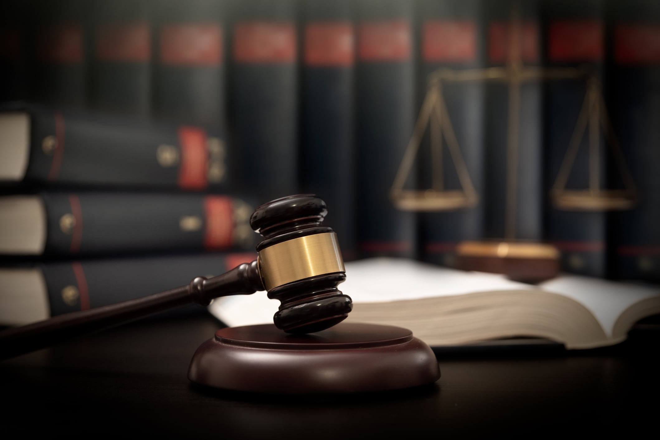 Judge gavel and scale in court. Legal concept