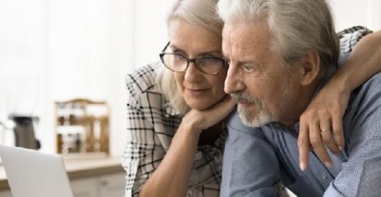 https-dontmesswithtaxes-com-wp-content-uploads-2026-04-older-couple-looking-intently-at-computer-screen-jpg